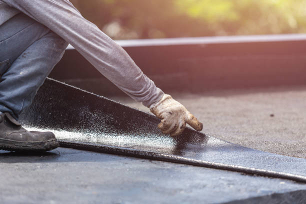 Professional Waterproofing technician working in Rossville, MD